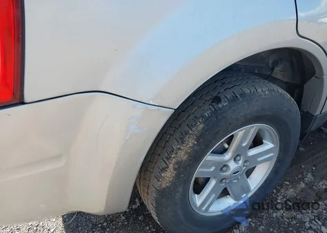 2009 Ford Escape Hybrid Limited z USA, uszkodzony, nr VIN 1FMCU49309KA49573